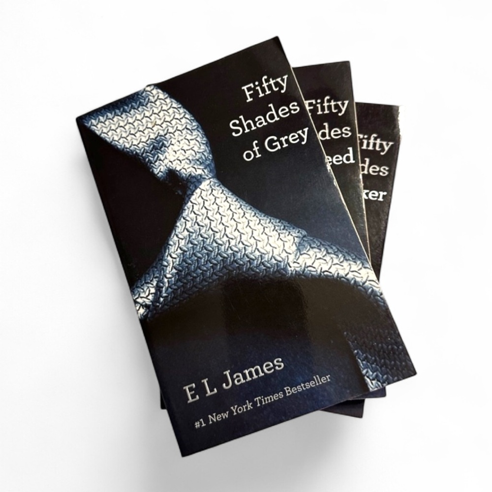 Fifty Shades of Grey Trilogy by E.L.
James - 2nd Edition, Never Opened